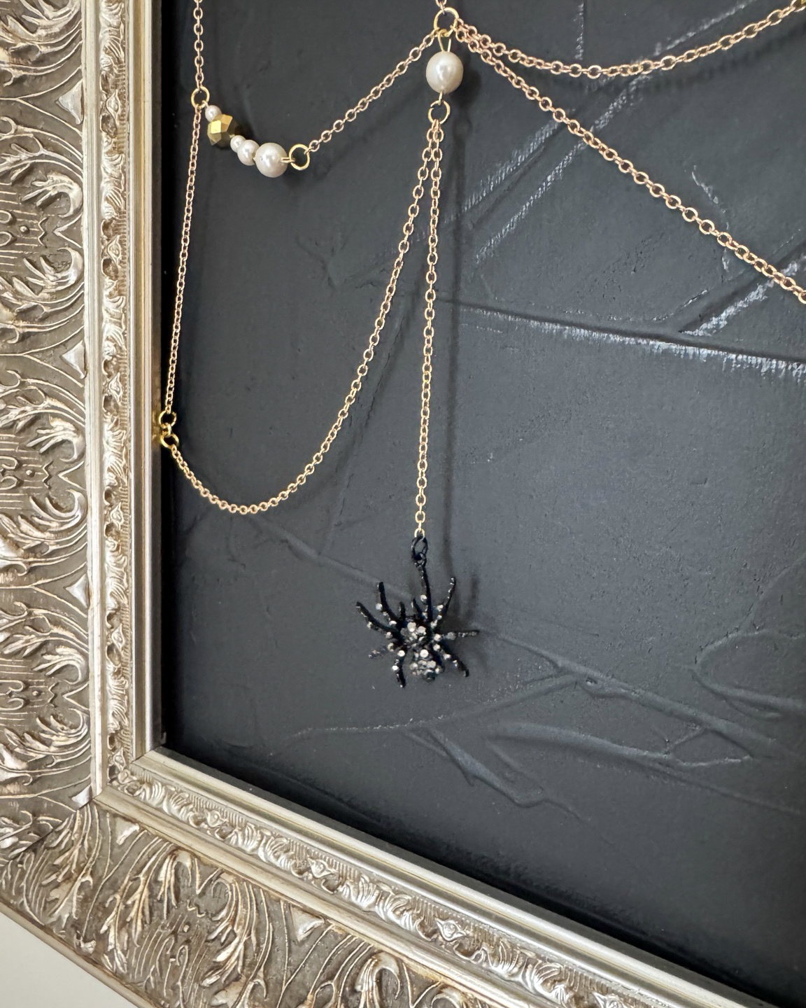 Close-up of the jeweled black spider in Weaver